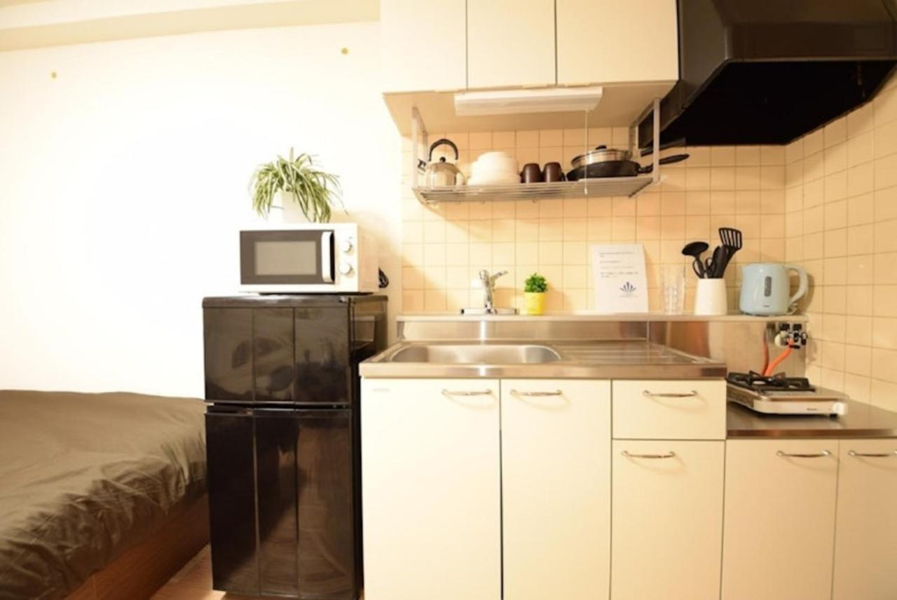 ローヤルハイツ菊水駅 Appartement Sapporo Buitenkant foto